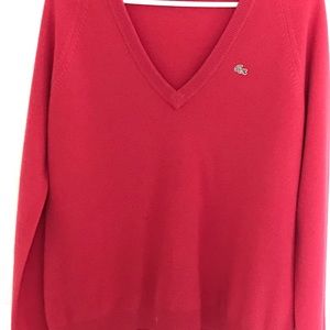 Magenta cashmere Lacoste V neck sweater.